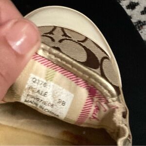 Women’s coach walking shoes.